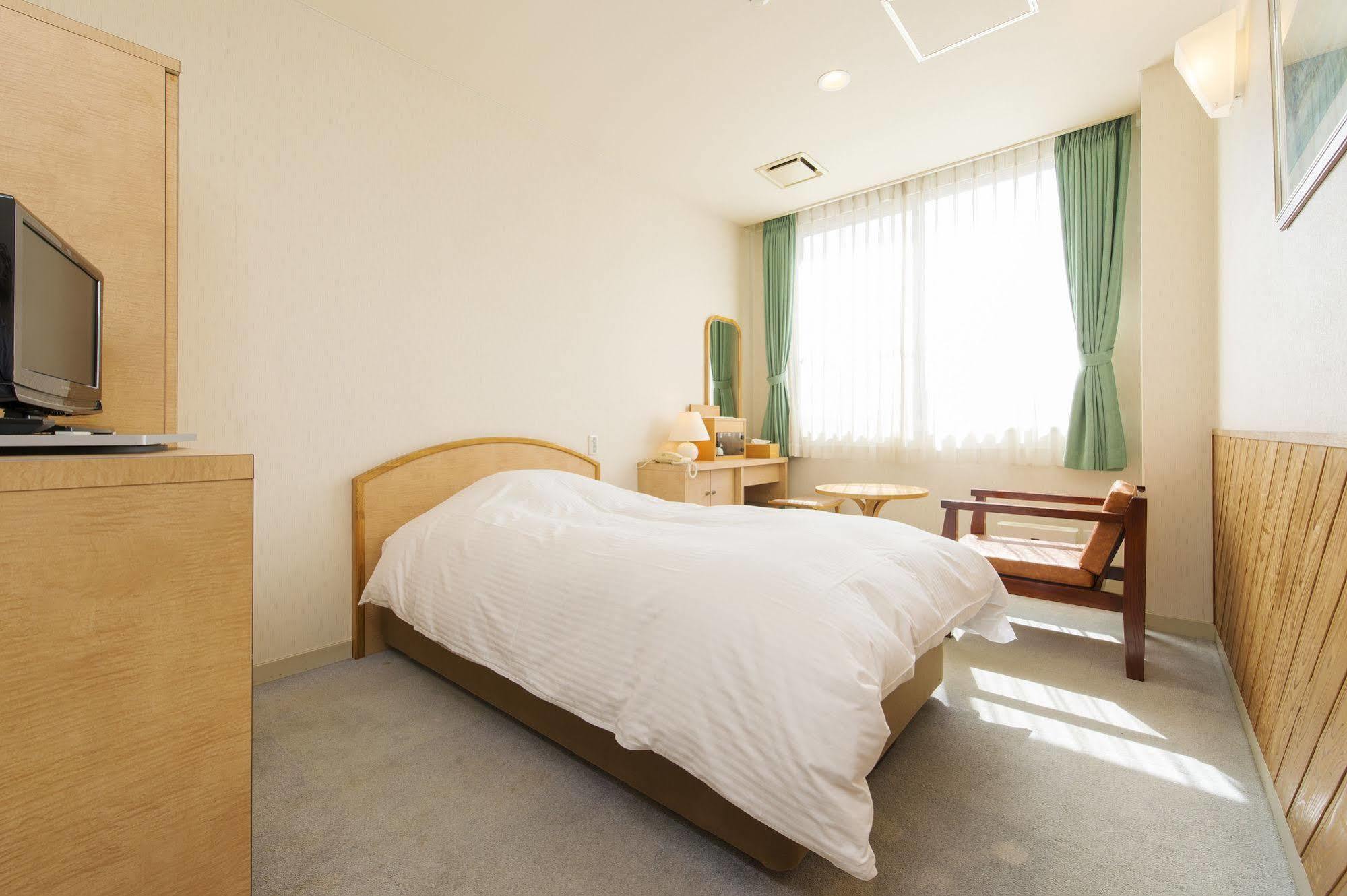 Hotel Takachiho Extérieur photo
